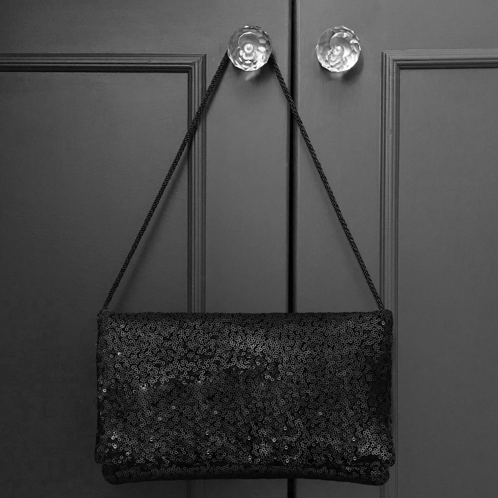 Black sequin plain clutch handbag