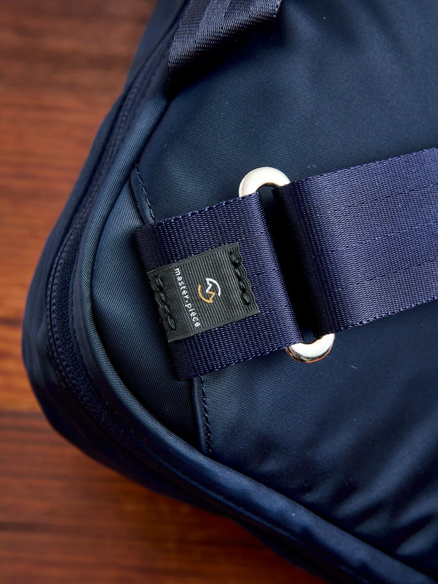 Progress Shoulder Carry Bag in Navy