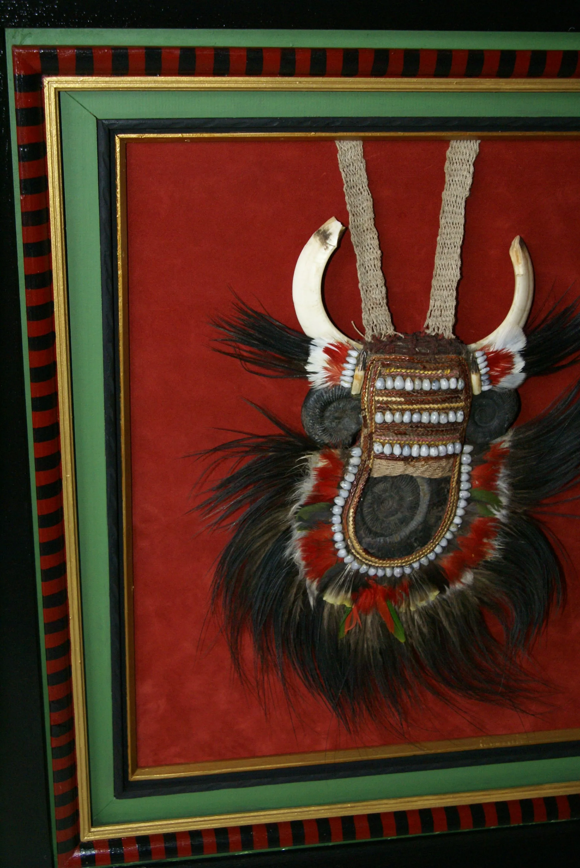 Rare Body Art : Dani “Big Man” Pectoral Trophy, Bride Price, Currency, Feud Payment, Highly Collectible: Ammonite, Boar Tusks, Cassowary, Seed beads, Bark Twine etc… Custom framed, 28” x 24 ½”, Collected in the late 1900’s. Museum Quality, New Guinea.