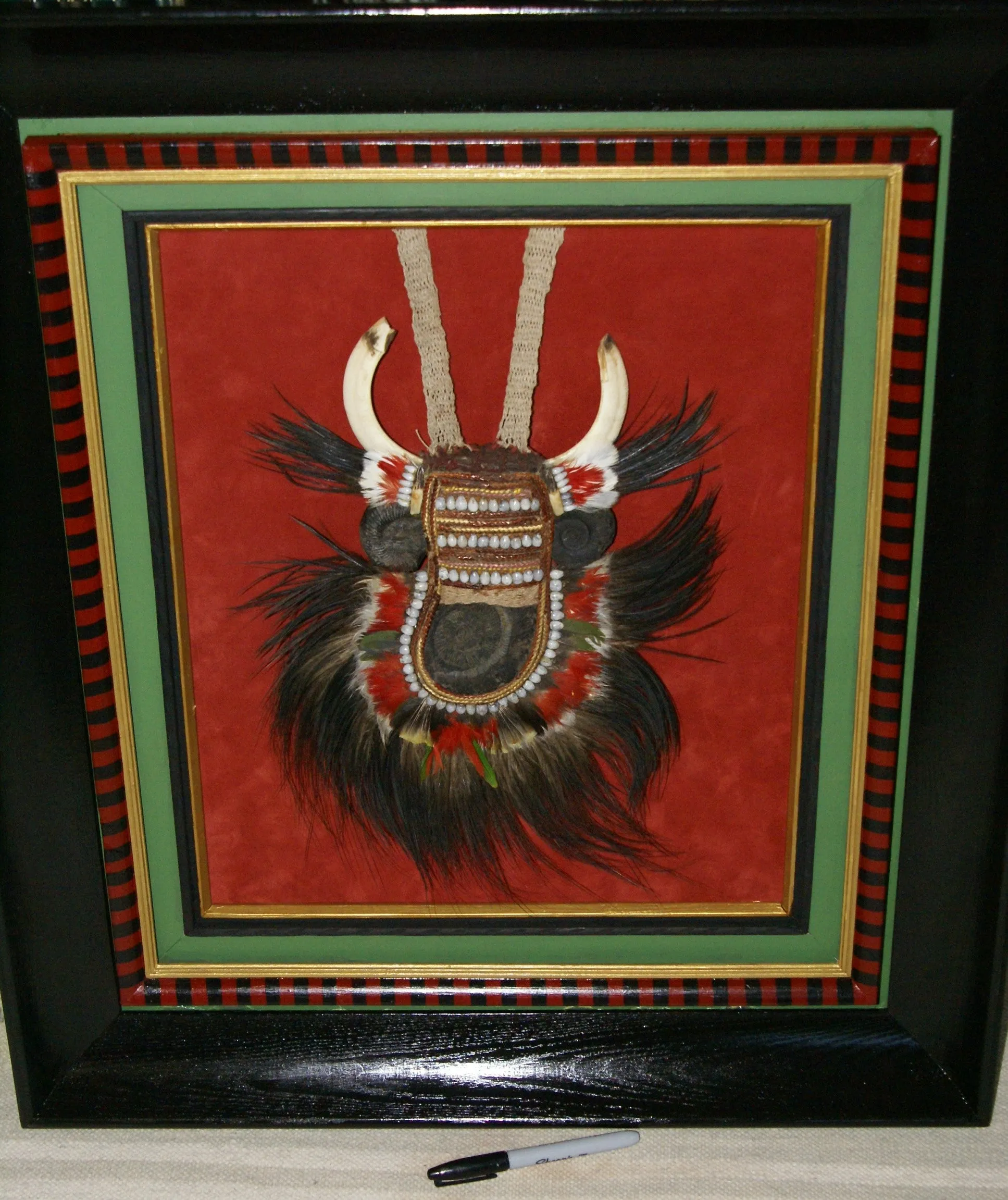 Rare Body Art : Dani “Big Man” Pectoral Trophy, Bride Price, Currency, Feud Payment, Highly Collectible: Ammonite, Boar Tusks, Cassowary, Seed beads, Bark Twine etc… Custom framed, 28” x 24 ½”, Collected in the late 1900’s. Museum Quality, New Guinea.