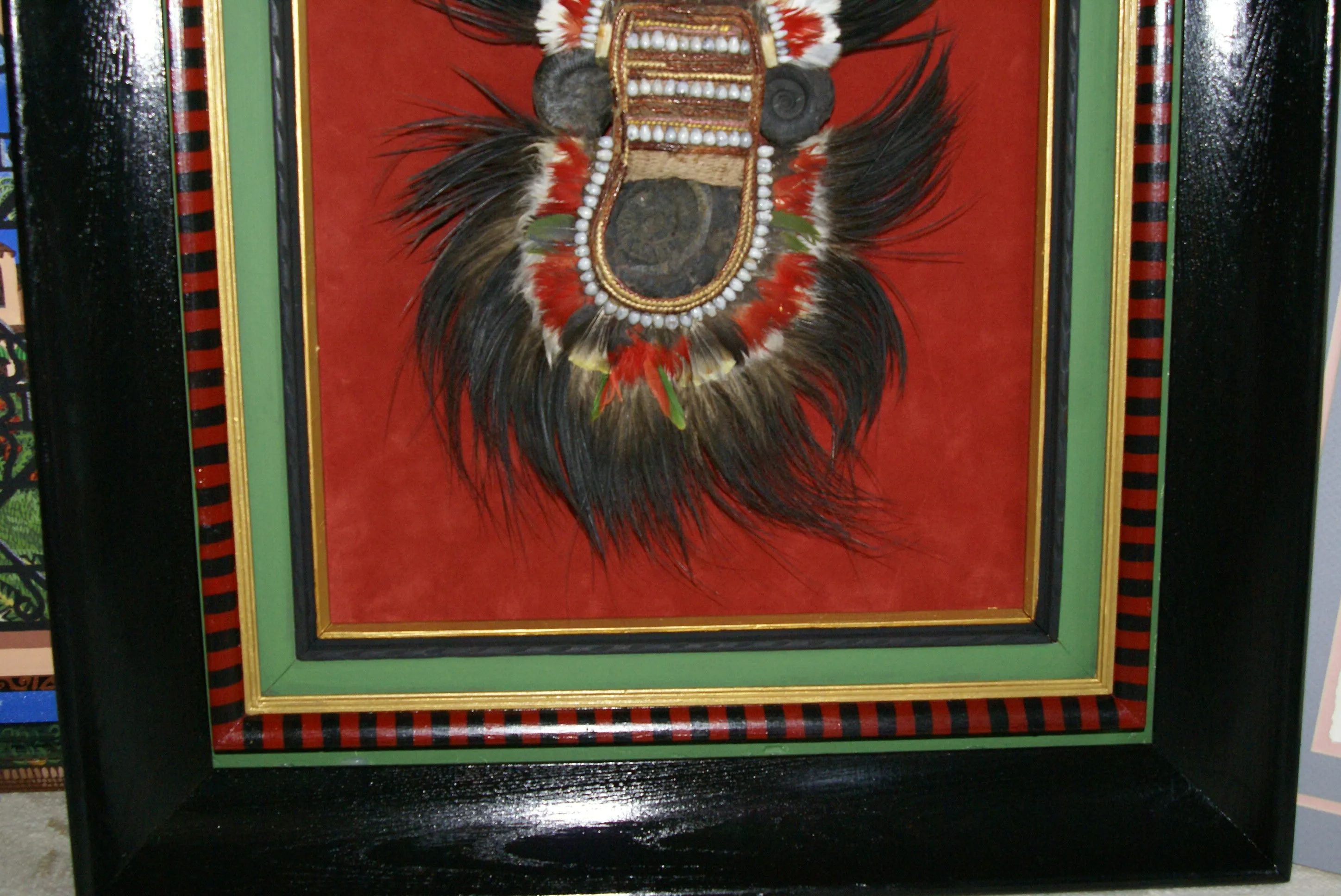 Rare Body Art : Dani “Big Man” Pectoral Trophy, Bride Price, Currency, Feud Payment, Highly Collectible: Ammonite, Boar Tusks, Cassowary, Seed beads, Bark Twine etc… Custom framed, 28” x 24 ½”, Collected in the late 1900’s. Museum Quality, New Guinea.